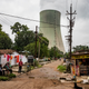 A cooling tower used by the Hasdeo Thermal Power Station in Darri near Korba. The plume emitted from its opening is only steam—but the smokestack belching pollution isn’t too far away.